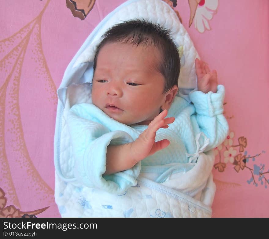 Dancing Baby on a bed