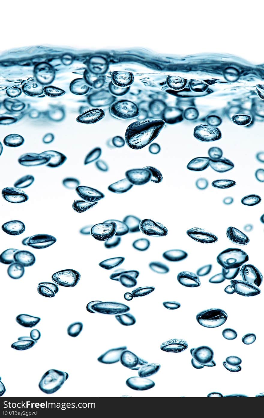 Many air bubbles in water isolated on white