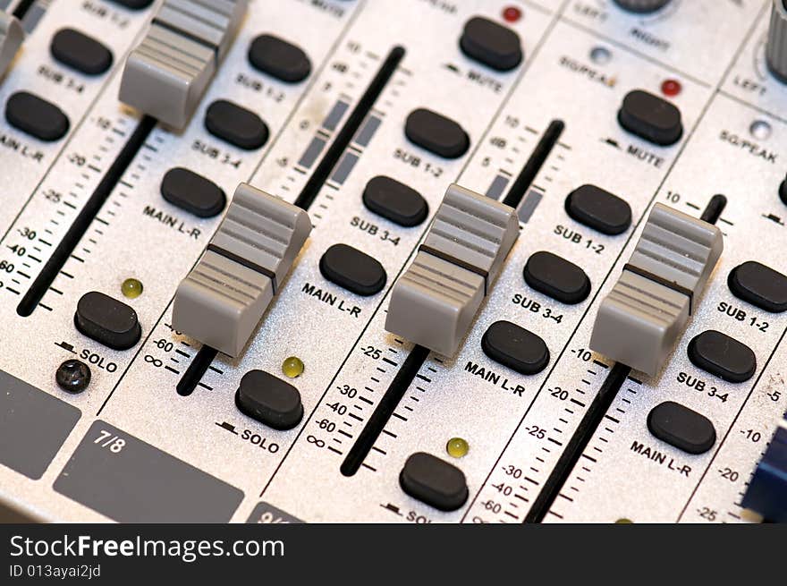 Closup on grey sound mixer station