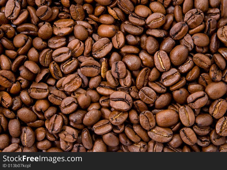 Background, pattern close-up shot of coffee beans