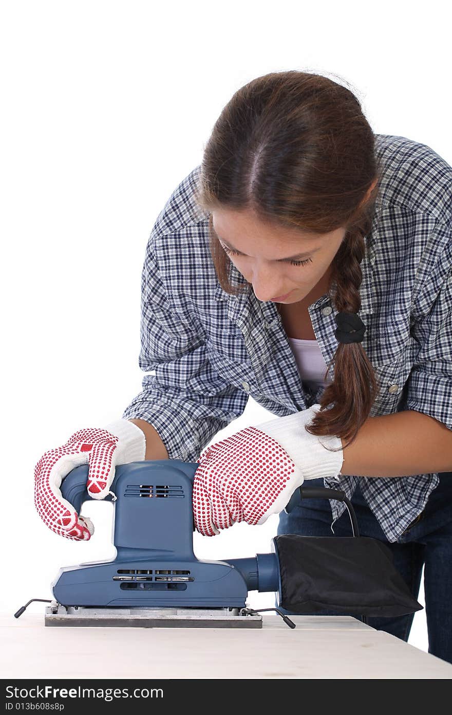 Woman carpenter at work on white background