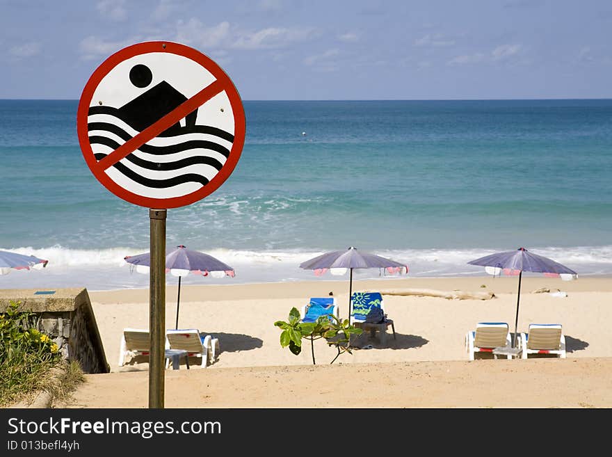 No swimming sign at a beach. No swimming sign at a beach