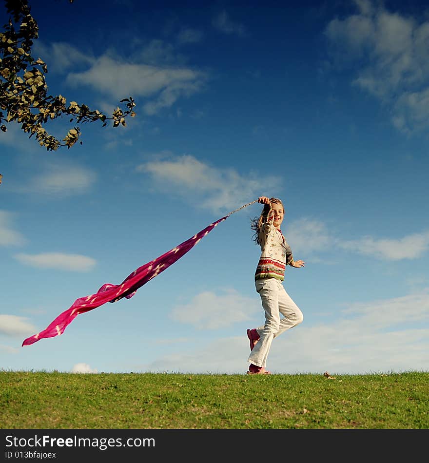 Young girl having fun in a park