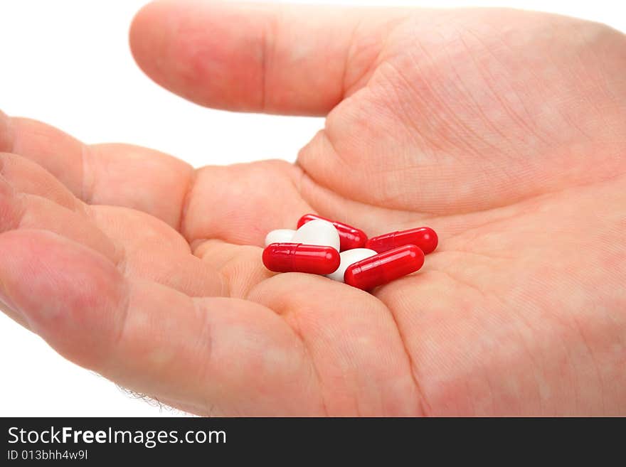 Hand With Assorted Pills