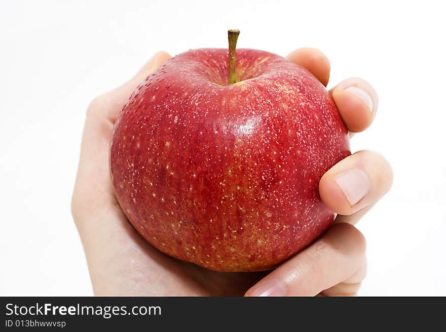 Man holding a red apple isolated on white background. Man holding a red apple isolated on white background