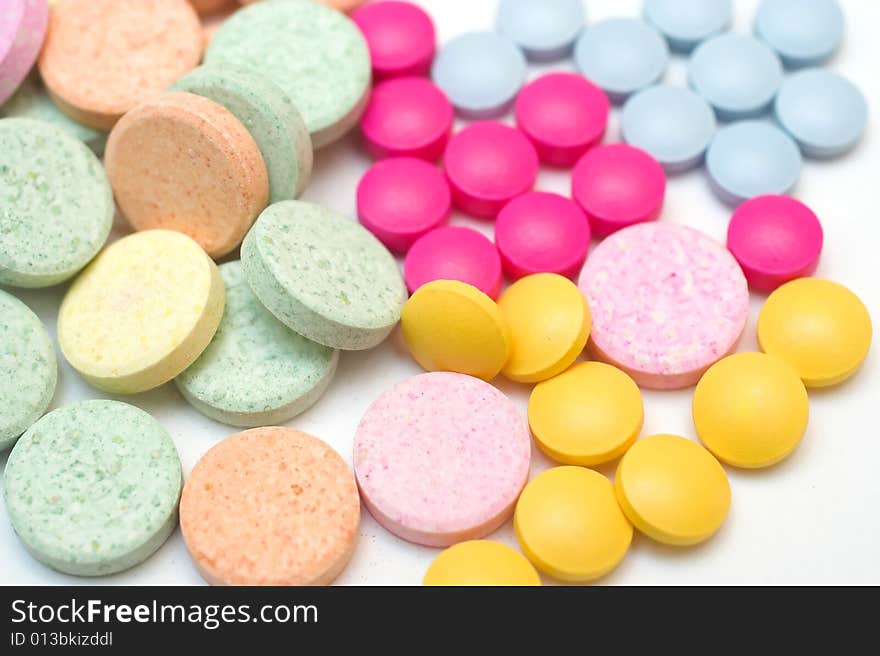 A collection of colorful pills, closeup. A collection of colorful pills, closeup