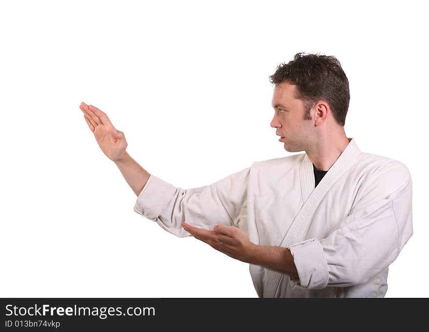 Side view of man in martial arts pose