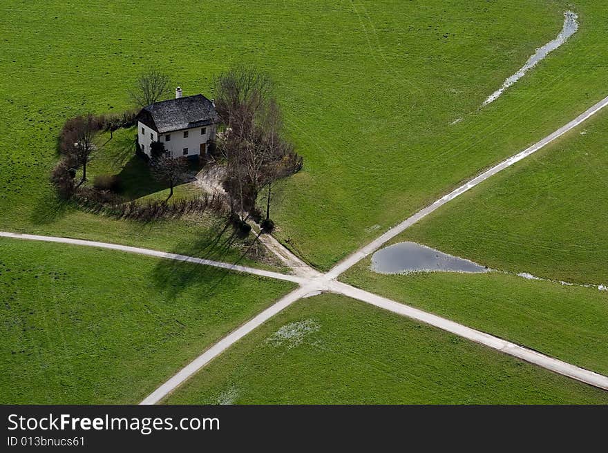 Top view of the small house near road crossing in Salzburg (West Austria)