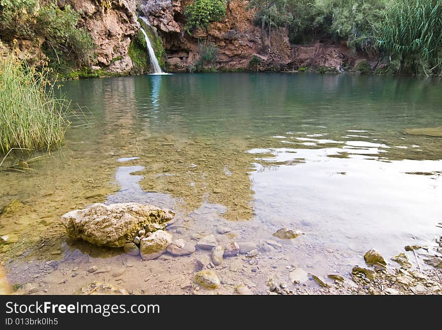 Eautiful waterfall in hidden secret lagoon. Eautiful waterfall in hidden secret lagoon.