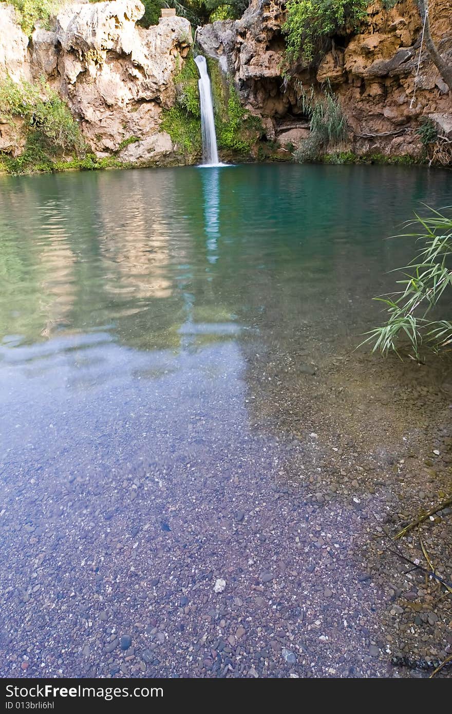 Eautiful waterfall in hidden secret lagoon. Eautiful waterfall in hidden secret lagoon.