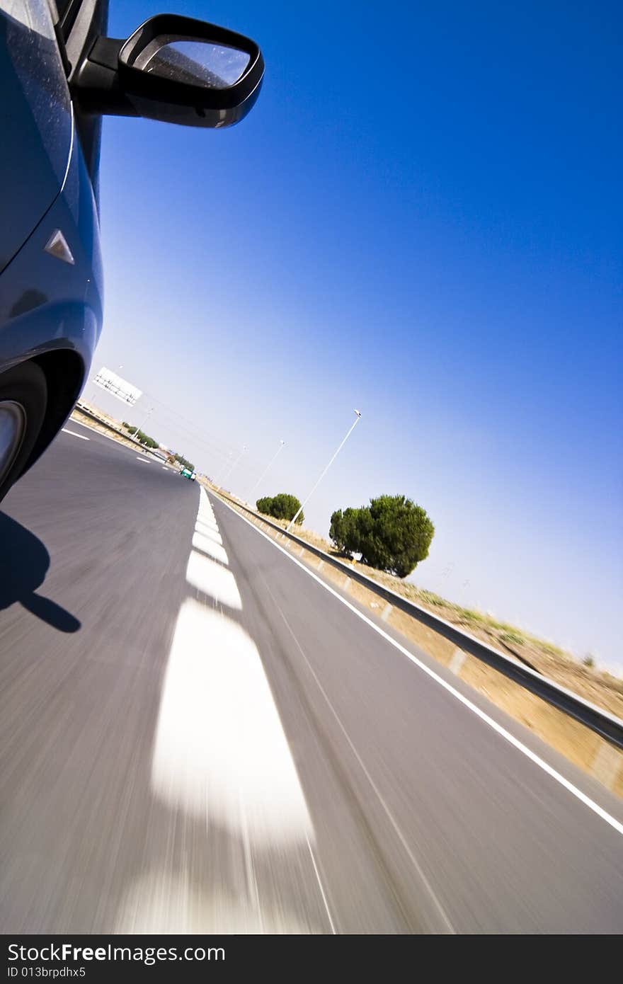 Blue car at high speed on the road. Blue car at high speed on the road