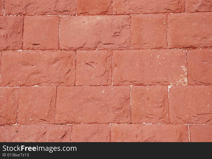 The ancient Chinese red brick wall background.