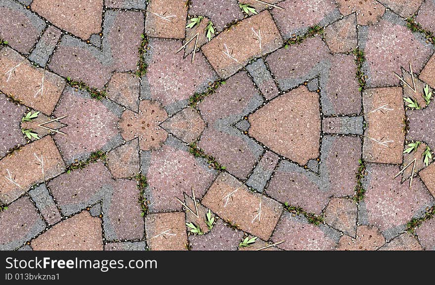 A seamless pattern background made out of stone slabs on the ground. A seamless pattern background made out of stone slabs on the ground.