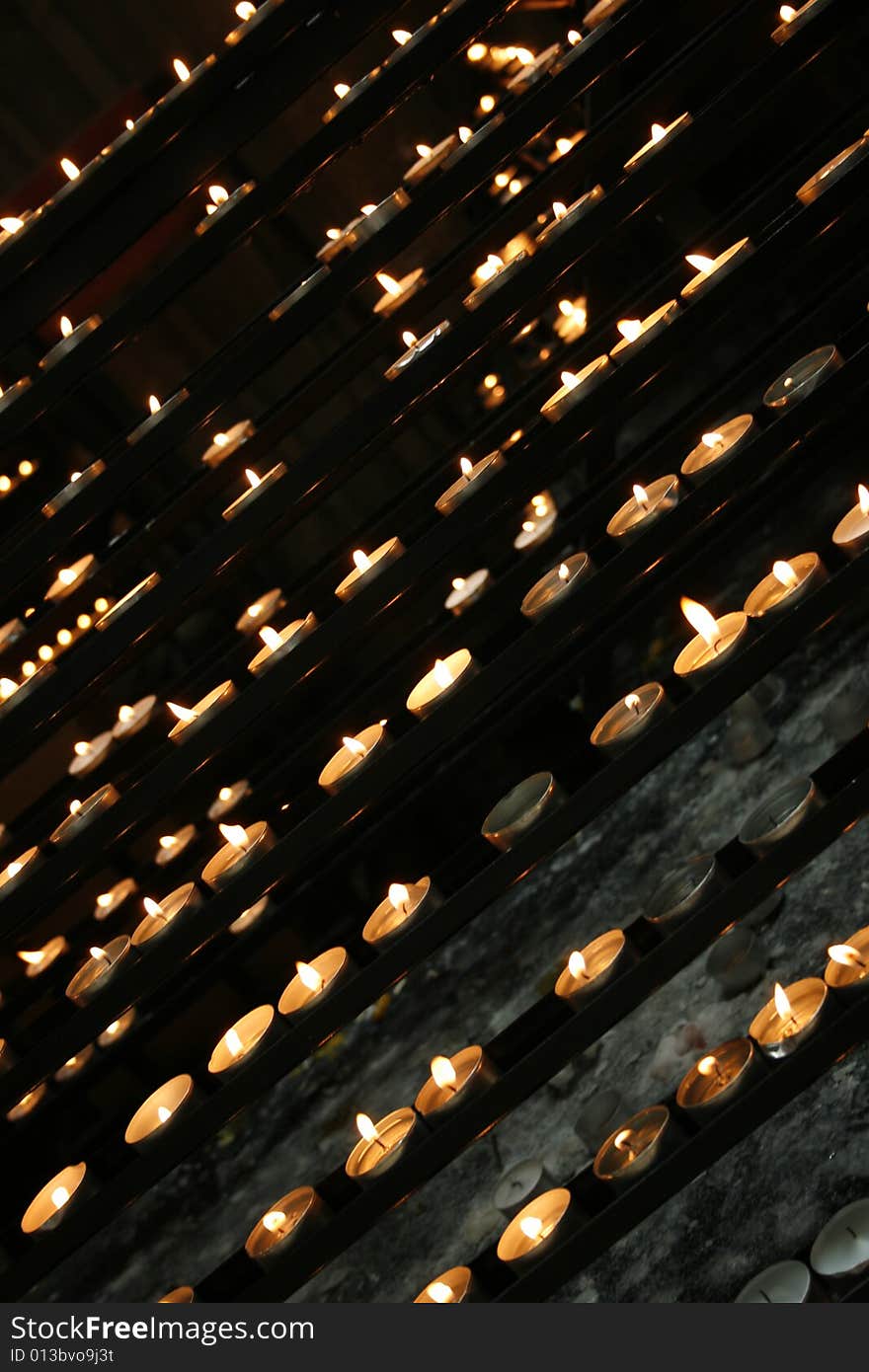 Very romantic candles background in the church