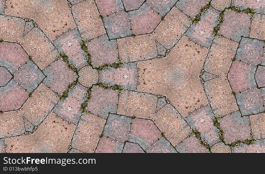 A seamless pattern background made out of stone slabs on the ground. A seamless pattern background made out of stone slabs on the ground.