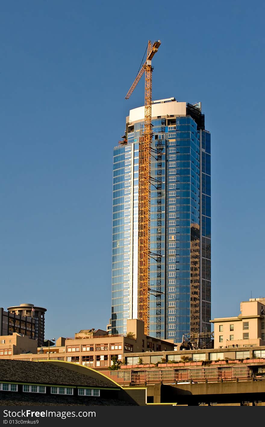 New construction and tower crane in downtown Seattle Wa. New construction and tower crane in downtown Seattle Wa