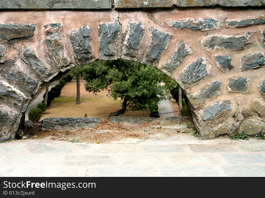 Stone wall with an arch in the Viceroy's residence in Shimla