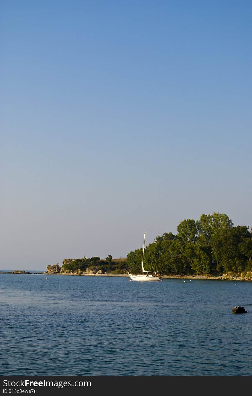 A sailing boat near the shore