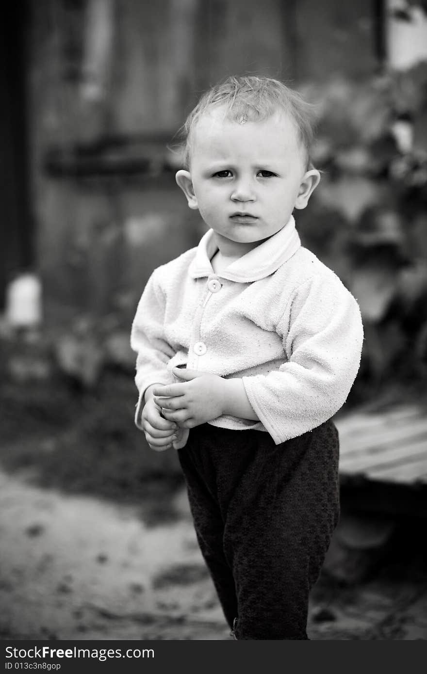 Baby on a rural yard