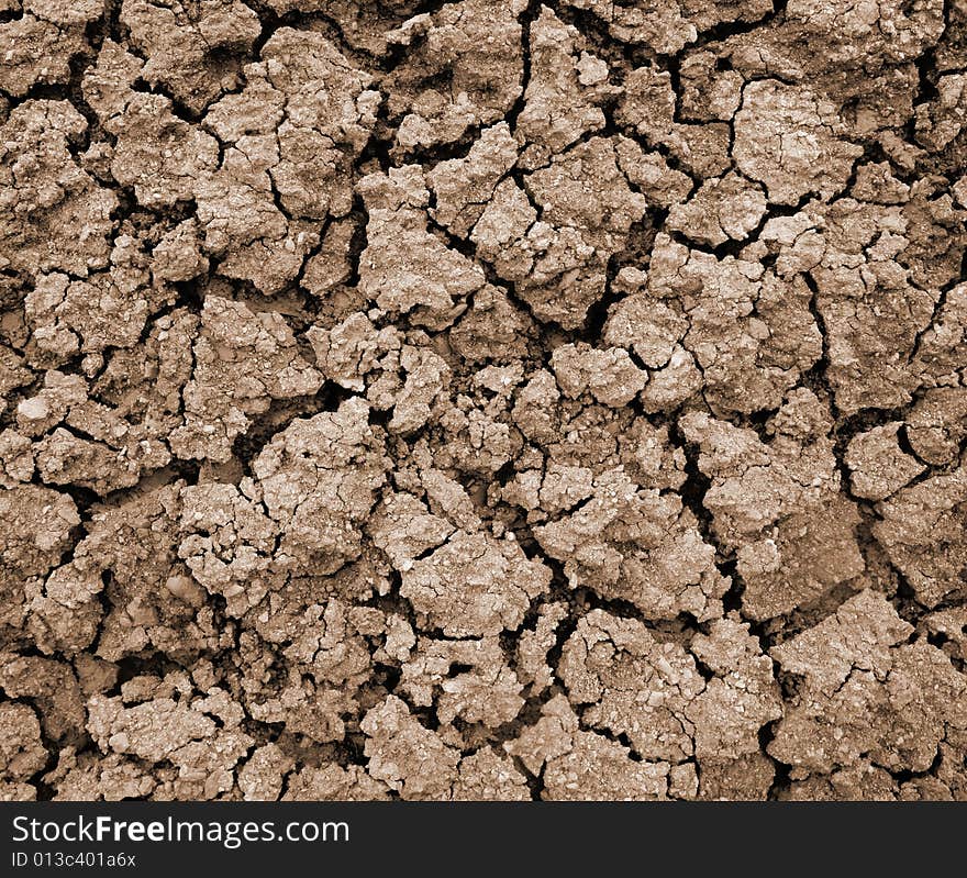 Monochromatic photo of a dry soil surface. Monochromatic photo of a dry soil surface.