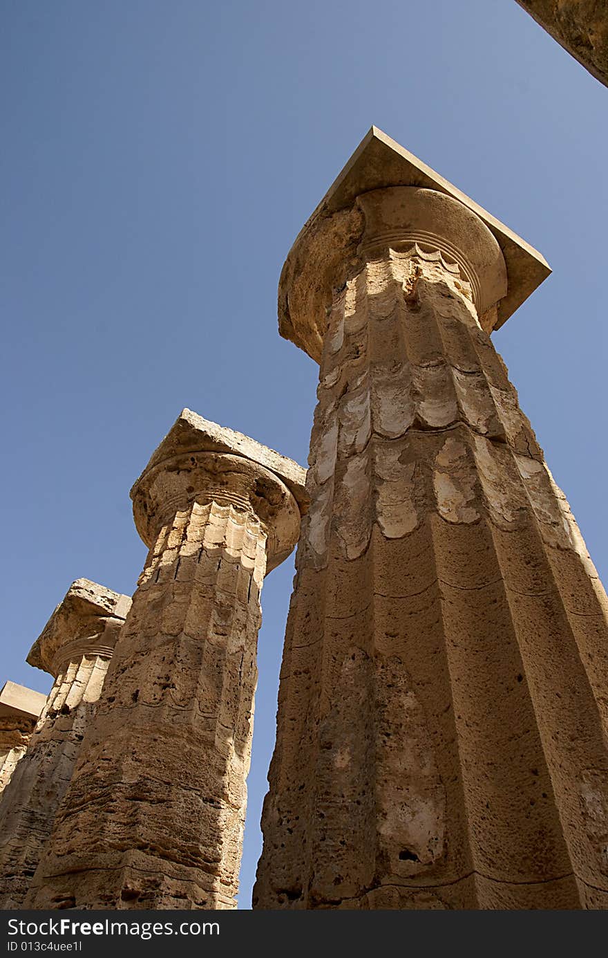 Bottom to top view of columns at the Greek Temple of Selinunte (Sicily, Italy). UNESCO world heritage site. Bottom to top view of columns at the Greek Temple of Selinunte (Sicily, Italy). UNESCO world heritage site