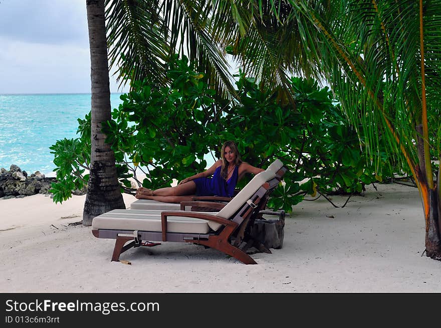 Woman Lying On Chaise Longue