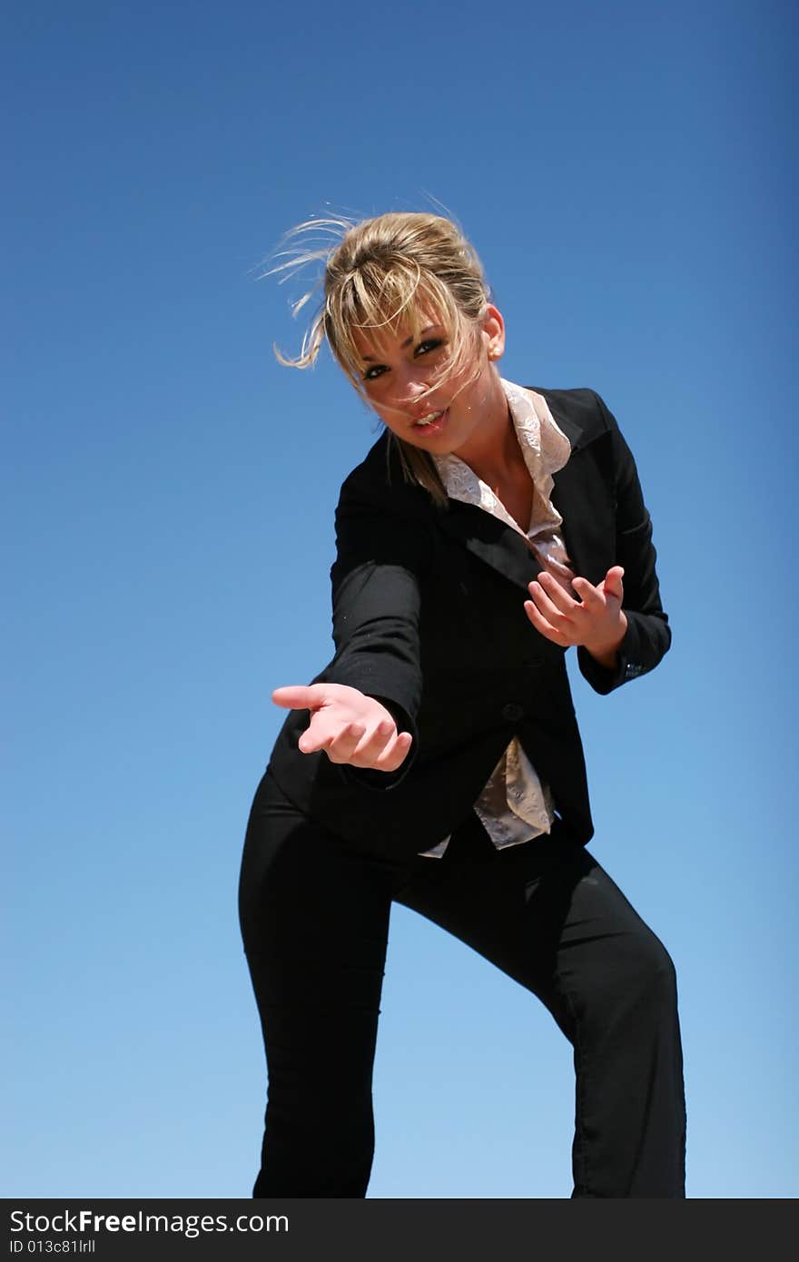 Young businesswoman in dark suit