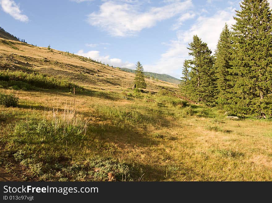 Mountains landscape in evening sun rays. Mountains landscape in evening sun rays