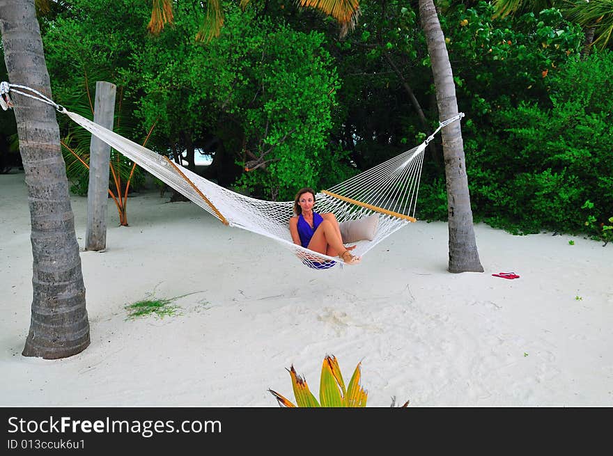 Woman lying on the hammock