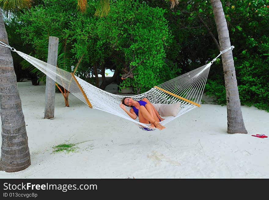 Woman lying on the hammock