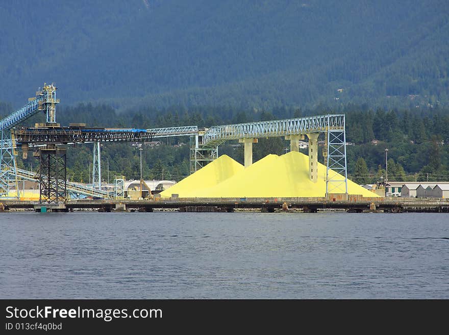 Sulpher Piles waiting to be loaded on to ships on the Waterfront. Sulpher Piles waiting to be loaded on to ships on the Waterfront.