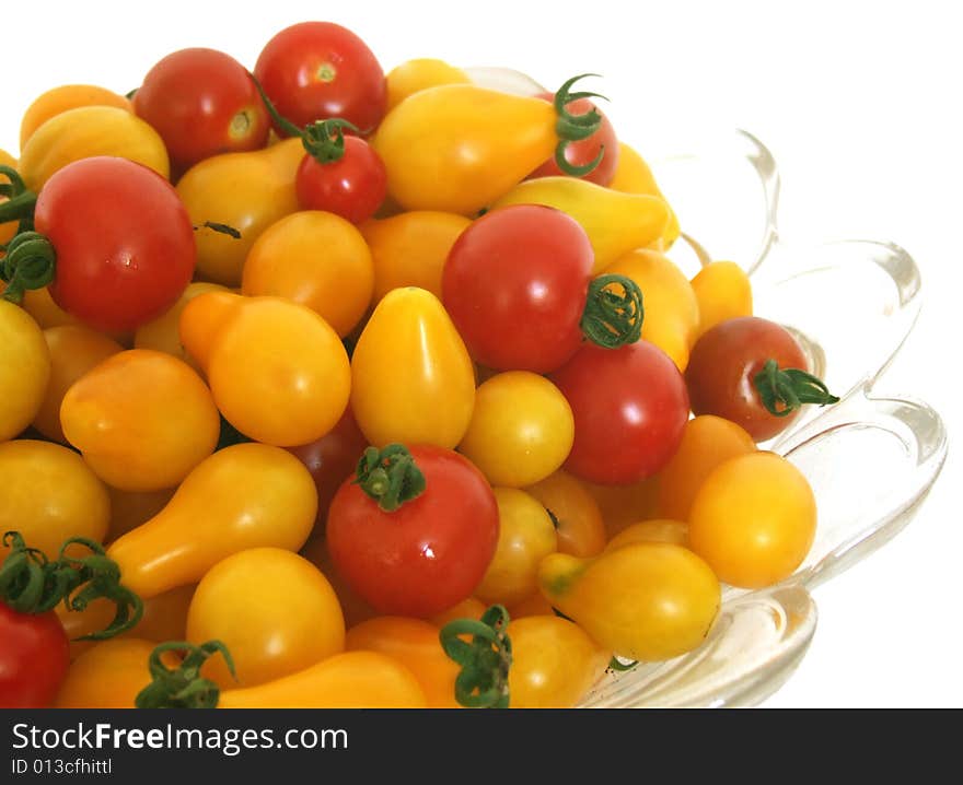 Lot of yellow and red tomatoes