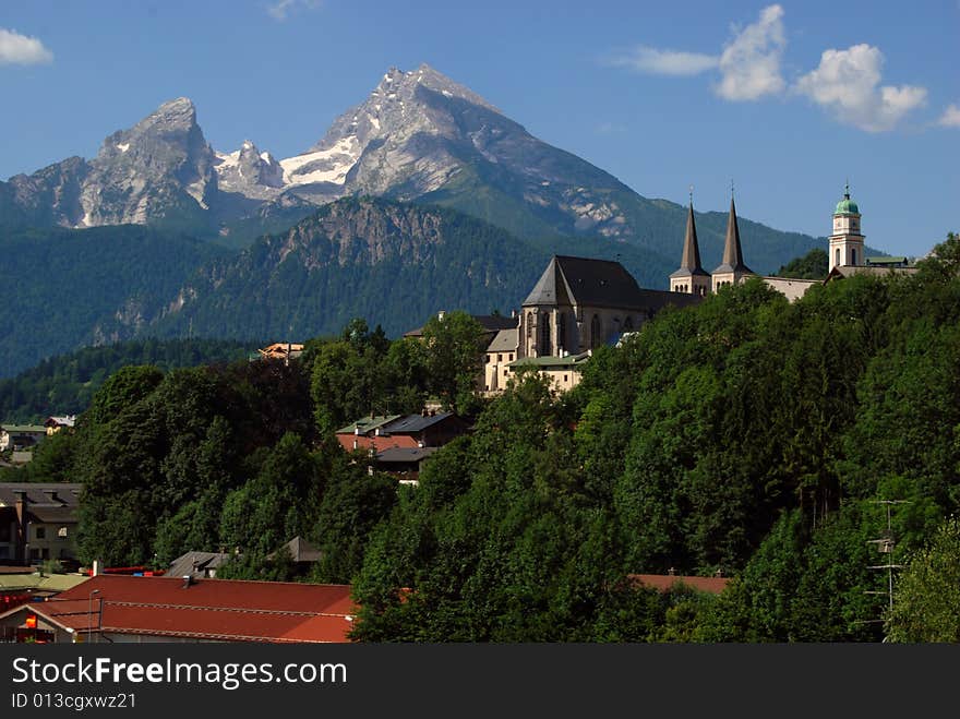 Bertesgaden church towers and watzman mountains in background. Bertesgaden church towers and watzman mountains in background