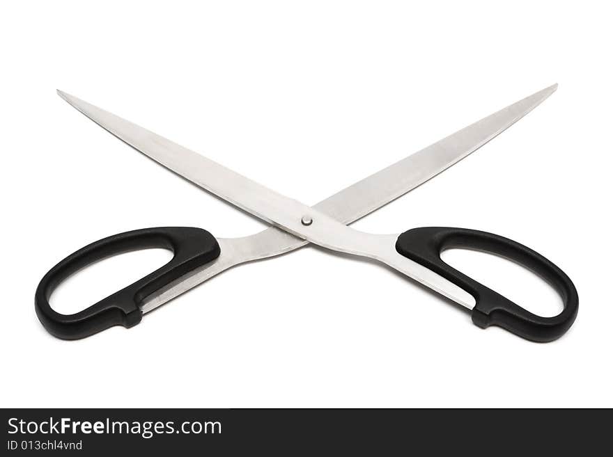 Modern metal scissors on a white background