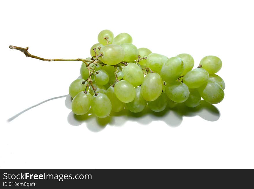 Fresh green grapes cluster isolated. Fresh green grapes cluster isolated