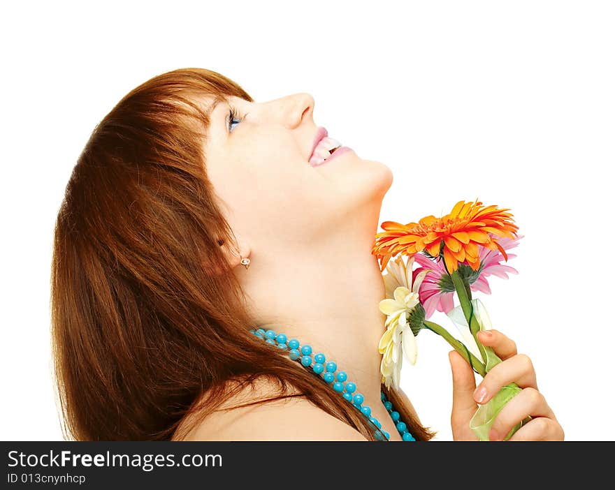 Happy young girl with flowers over white