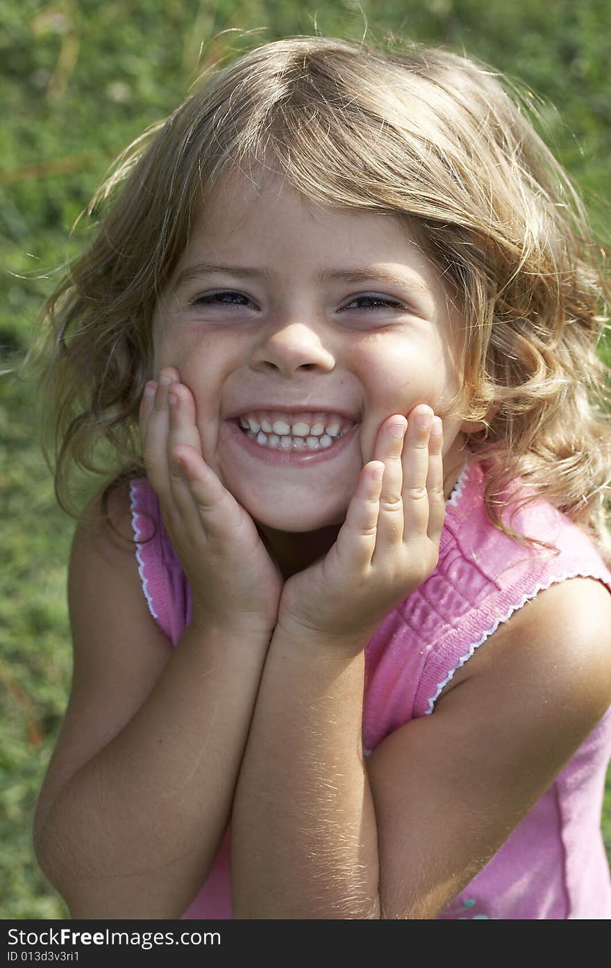 A picture of a cute little girl smiling