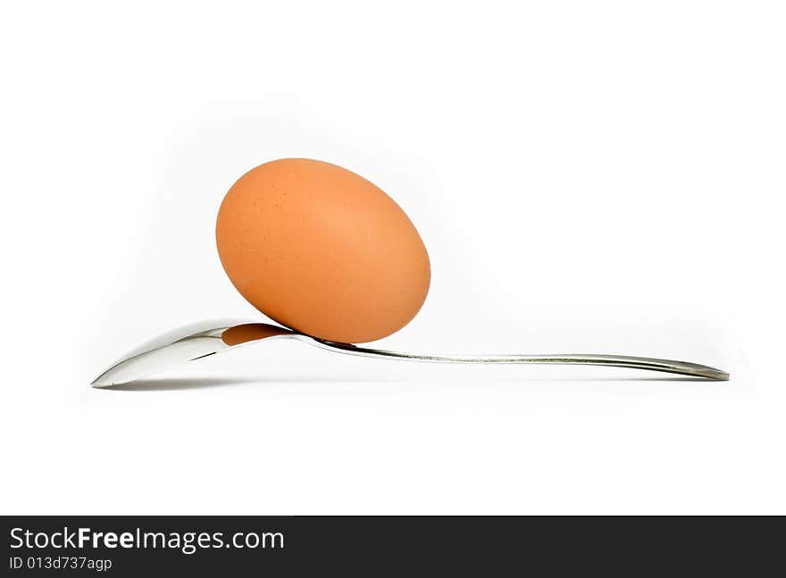 Egg and spoon isolated