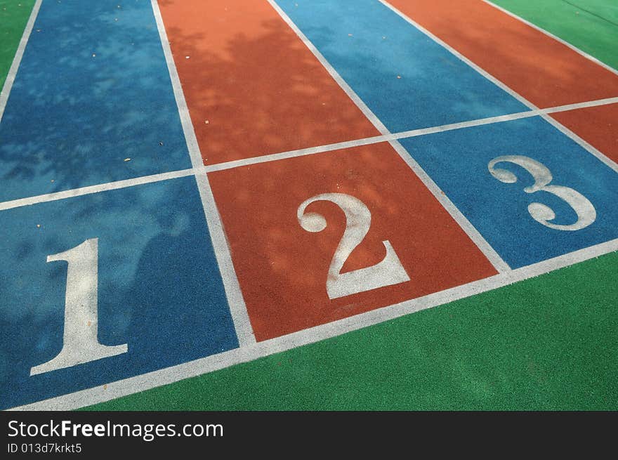 Colorful racetracks with white numbers