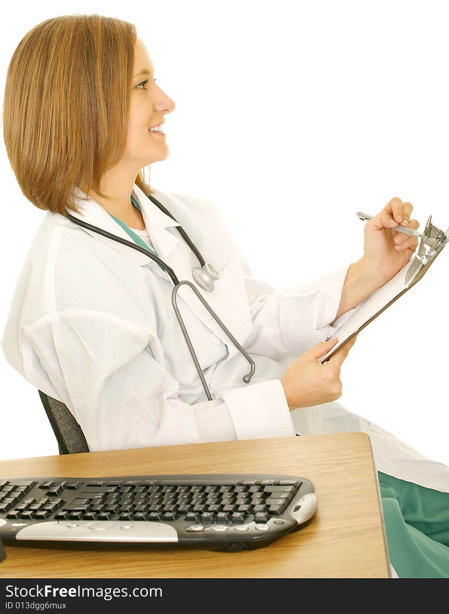 Isolated woman in doctor coat holding and ready to write on clip board, looking to her side. Isolated woman in doctor coat holding and ready to write on clip board, looking to her side