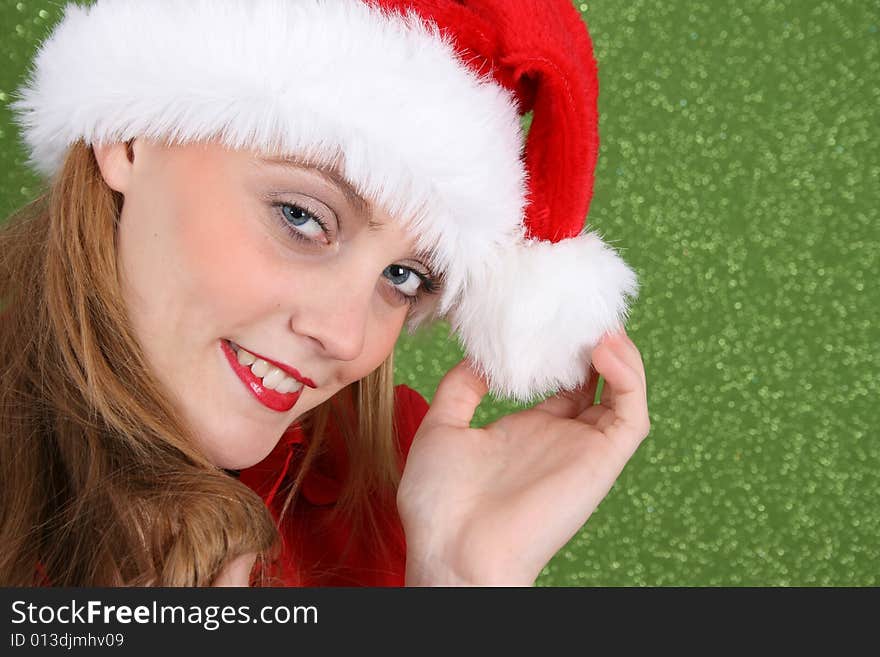 Female Model with red lips wearing a christmas hat. Female Model with red lips wearing a christmas hat