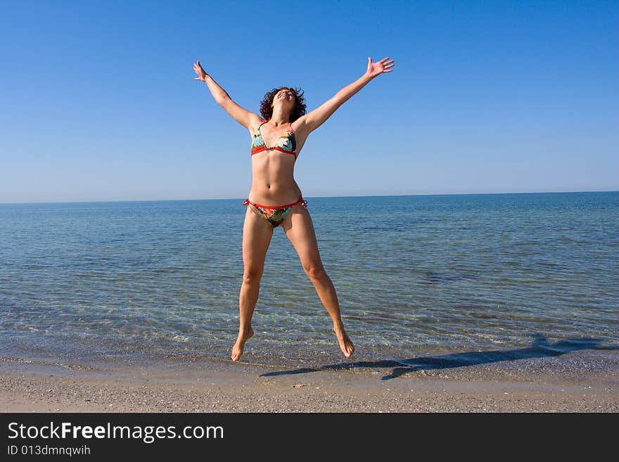 Woman Jump At Seaside