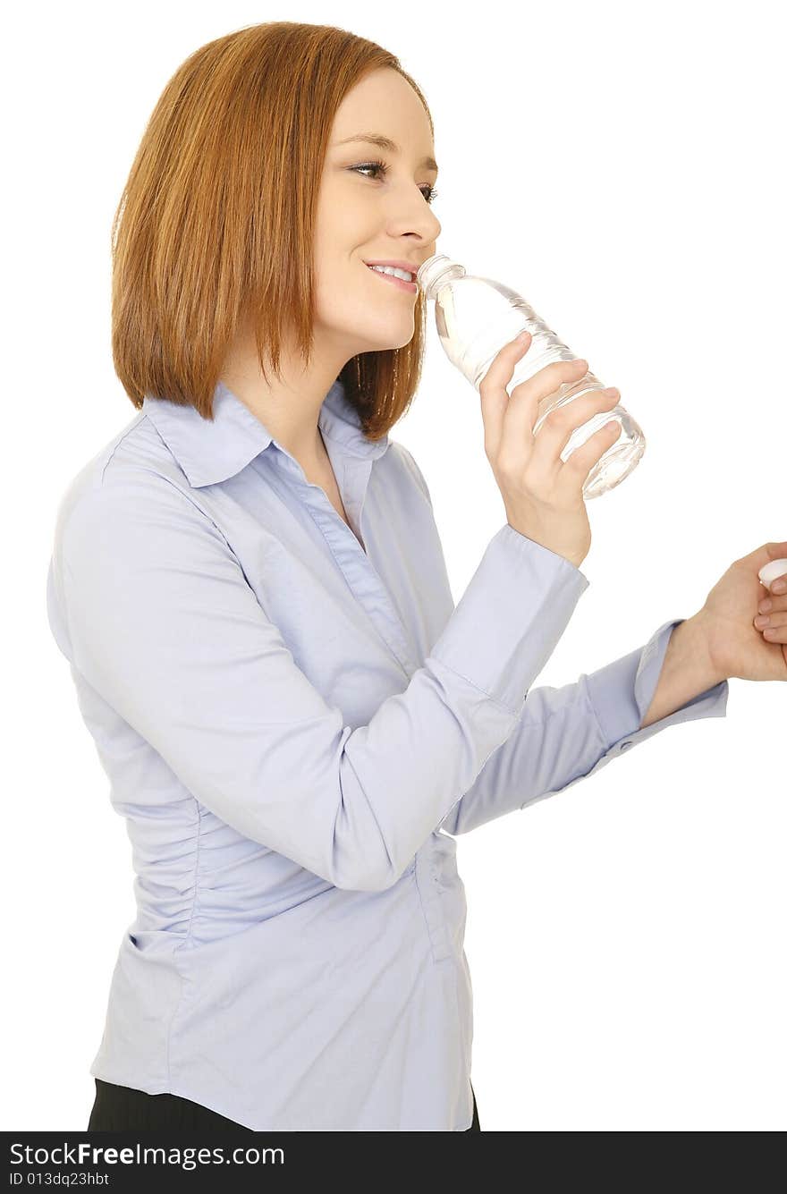 Shot of woman in casual dress with happy expression drinking bottle water. Shot of woman in casual dress with happy expression drinking bottle water