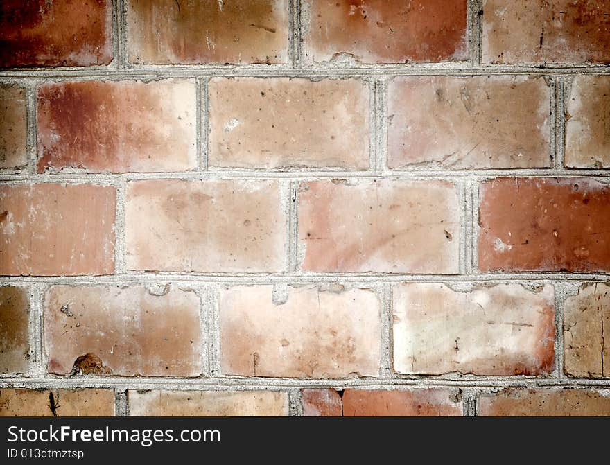 Old orange brick wall background. Old orange brick wall background