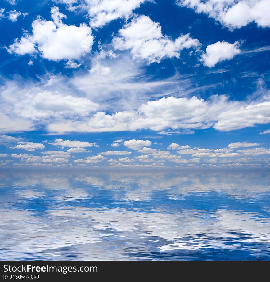 Beautiful seascape with white clouds on blue sky