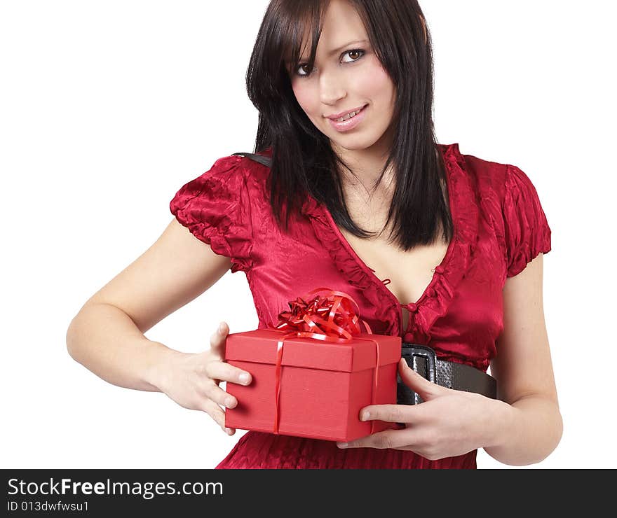 Portrait of a beautiful young brunette woman holding red gift box at a celebration, isolated on white background. Portrait of a beautiful young brunette woman holding red gift box at a celebration, isolated on white background