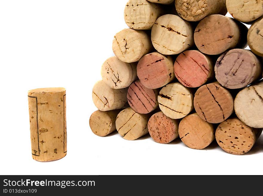 Wine corks over white backdrop