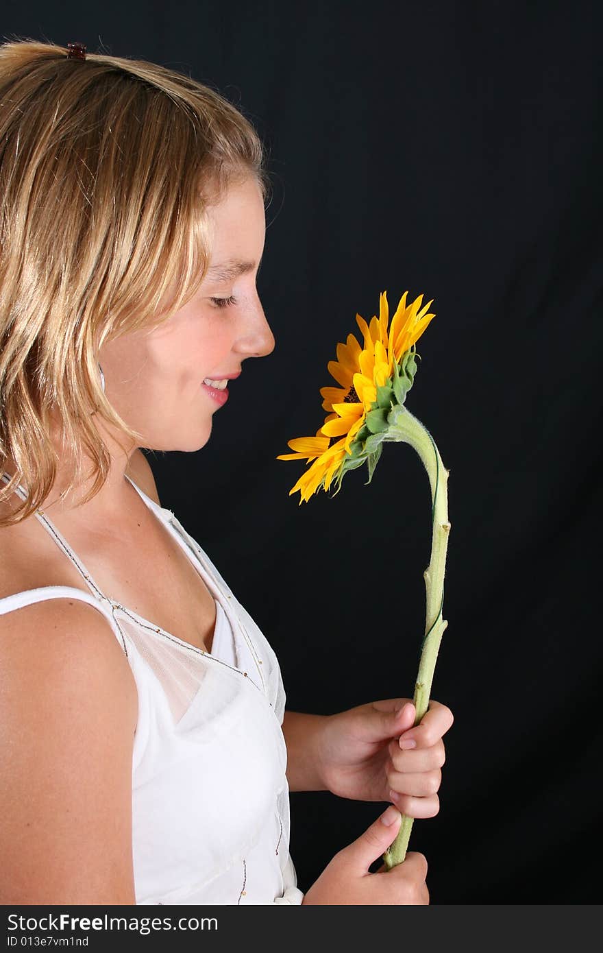 Teenage female model on a black background. Teenage female model on a black background