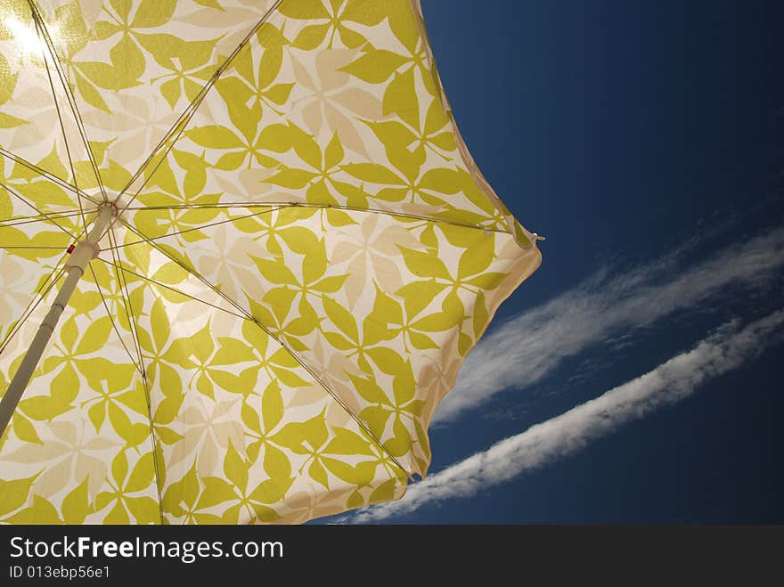 Green beach umbrella