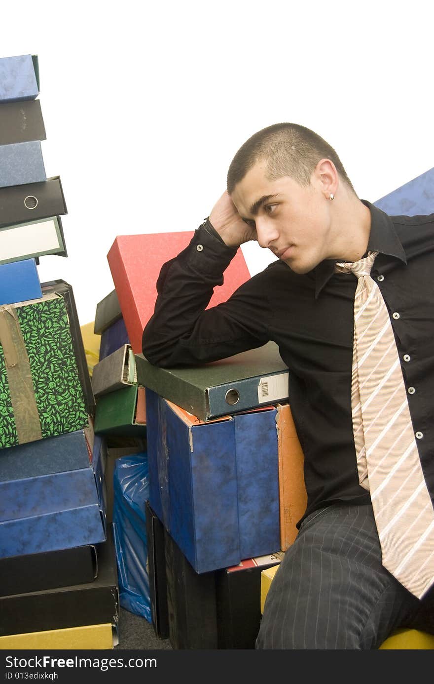 Young man with registers relaxing